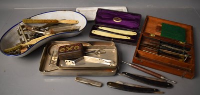 Lot 209 - A group of antique cut-throat razors to...