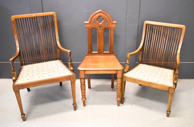 Lot 381 - A 19th century mahogany hall chair with shaped...