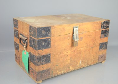 Lot 193 - An early 20th century pine iron-clad chest,...