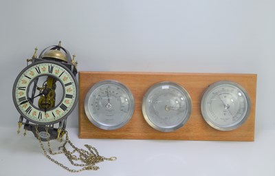 Lot 188 - A Negretti and Zambra barometer, hygrometer...