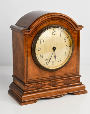 Lot 44 - An early 20th century walnut mantle clock,...