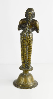 Lot 18 - A 19th century Indonesian brass sculpture of a...
