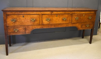 Lot 445 - A mid 18th Century oak dresser base with five...