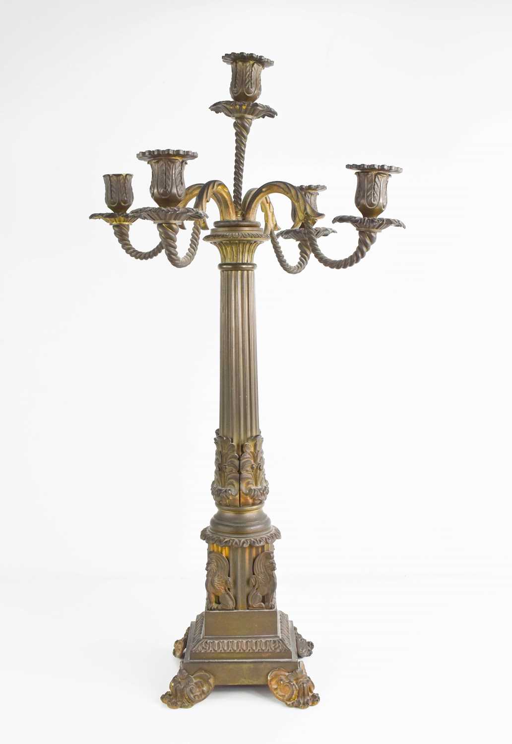 Lot 92 - A 19th century brass Empire style candelabra,...