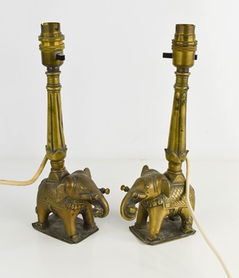 Lot 269 - A pair of brass Indonesian elephant form lamp...