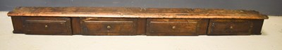 Lot 414 - An 18th Century oak narrow wall shelf,...