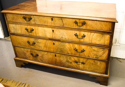 Lot 413 - A 19th Century walnut chest of four graduated...