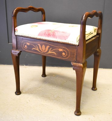 Lot 620 - An Edwardian mahogany piano stool with floral...