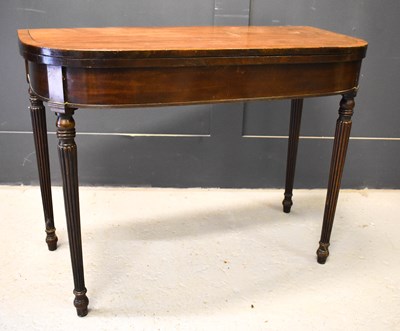 Lot 406 - A Regency mahogany fold over top tea table...