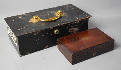 Lot 433 - An antique metal coin safe / strong box with...