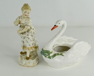 Lot 54 - A porcelain swan salt, with green ribbon to...