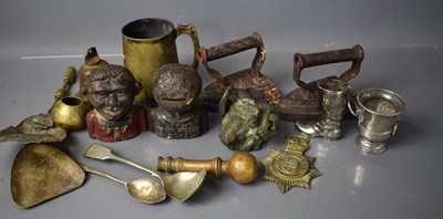 Lot 148 - A group of iron and brasswares, including a...