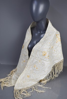 Lot 252 - A shaped ivory coloured Chinese shawl, Qing...