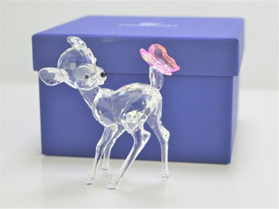 Lot 118 - A Swarovski Disney "Bambi" figure with pink...