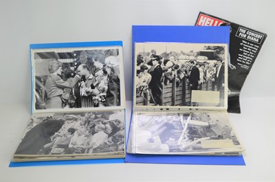 Lot 177 - Two albums of Royal photographs, mostly of...