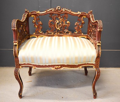 Lot 434 - An 18th century Austrian giltwood armchair in...