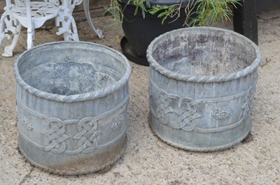 Lot 488 - A pair of large circular lead planters, with...