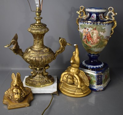 Lot 157 - A large gilt metal lamp base, cast with swans...