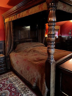 Lot 427 - An oak four poster double bed, together with...