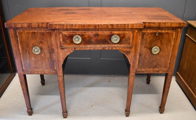 Lot 660 - A Regency period mahogany breakfront sideboard,...