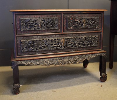 Lot 423 - A 19th century Chinese lacquered chest of...