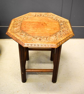 Lot 373 - An oak occasional table with an octagonal...