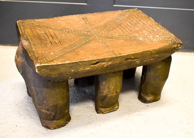 Lot 363 - An African carved stool with chip carved...