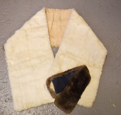 Lot 256 - A vintage rabbit fur stole with silk lining.