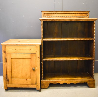 Lot 366 - A antique pine bedside cabinet with lift up...