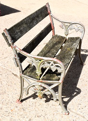 Lot 480 - A small antique cast iron bench, the two...