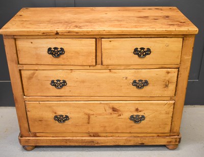 Lot 372 - An antique pine chest of two short over three...