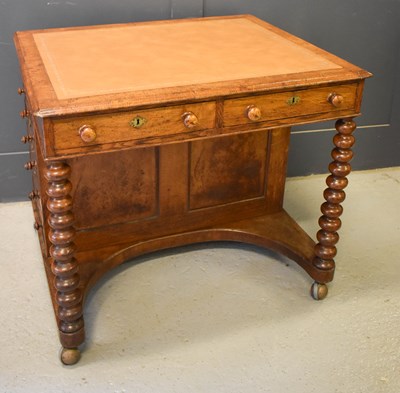 Lot 441 - A rare elm and yew wood desk with pale brown...