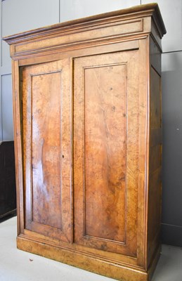 Lot 426 - An early 19th century fruit wood wardrobe with...