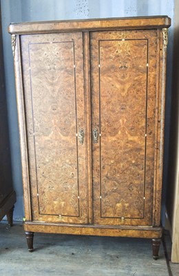 Lot 399 - An early 20th century French burrwood cabinet...