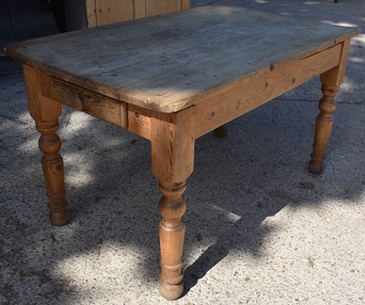 Lot 392 - An antique pine kitchen table with single...