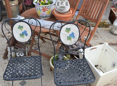 Lot 462 - A garden table and chairs together with a...