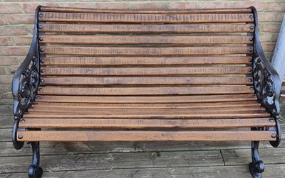 Lot 667 - A Victorian roll top 'Cherub' bench, with...