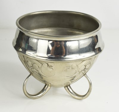 Lot 34 - An Archibald Knox pewter bowl raised on three...