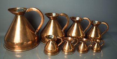 Lot 156 - A set of eight graduated Victorian copper...