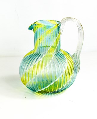 Lot 77 - A Venetian yellow and blue / green glass jug...