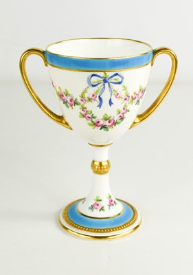 Lot 110 - A Minton porcelain twin handled christening...