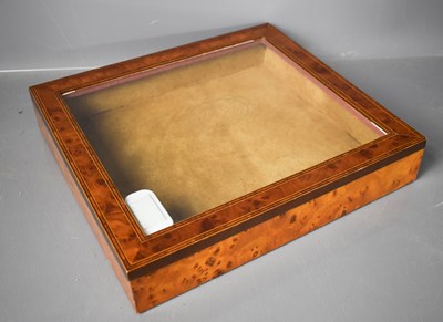 Lot 176 - A modern burrwood and suede lined cigar humidor.