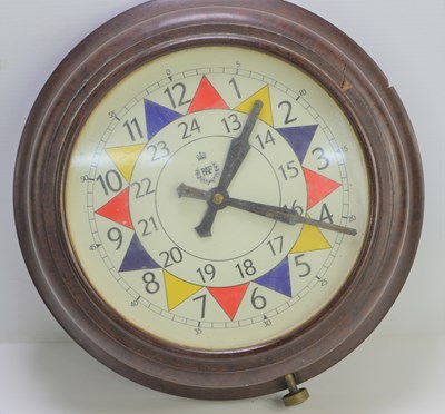 Lot 287 - An RAF electric wall clock in a bakelite case,...