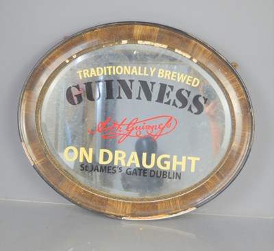 Lot 355 - A vintage Guinness advertising mirror, St...