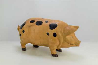 Lot 293 - A large cast iron piggy bank, 23cm high by 45cm.