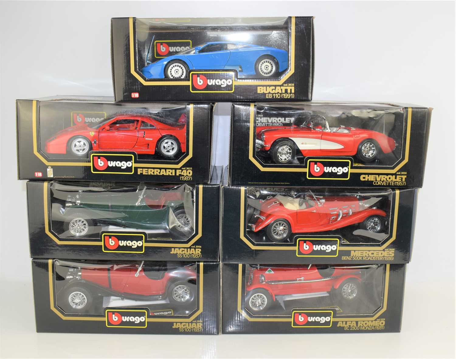 Lot 203 - Seven boxed Burago 1:18 scale diecast models...