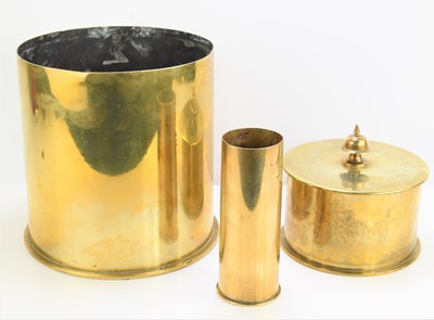 Lot 487 - A group of German WWI brass trench art shells,...