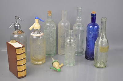 Lot 341 - A group of vintage wine and soda bottle to...