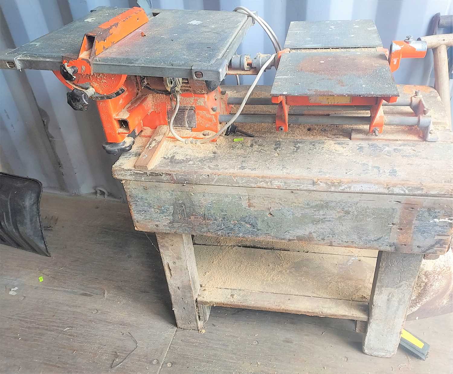 Lot 494 - An Alko table saw and planer with wooden bench...