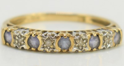 Lot 183 - A 9ct gold and five stone diamond ring, 1.6g